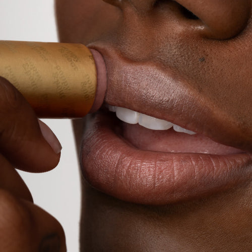 Close Up of Girl Using Roxie Lip Tint on Her Lips