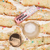 Birthday Confetti Cake lip balm and lip scrub on a birthday cake background., 3 of 4