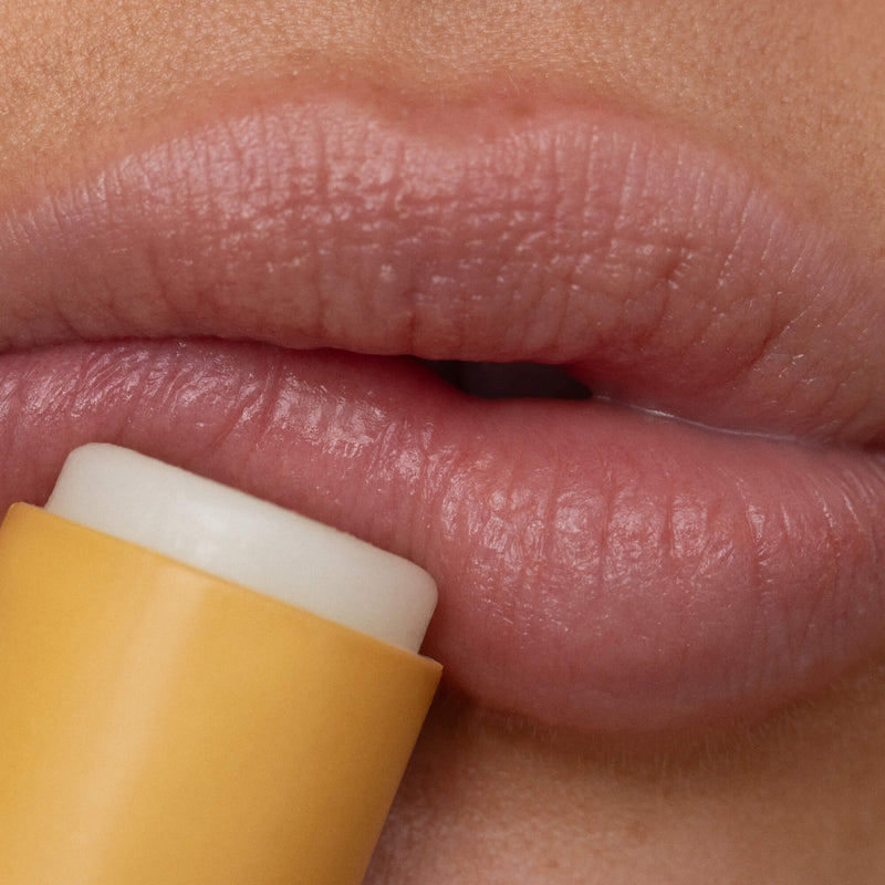 Women Using Lemon Bloom Lip Balm