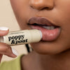 Women Using Poppy and Pout Marshmallow Creme Lip Balm, 5 of 5