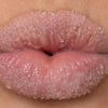 Woman Exfoliating Lips with Sugar Scrub, 4 of 5