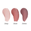 Swatches of Daisy, Roxie, and Donna lip tints on a white background, 3 of 5