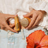 A Woman Showing Wild Honey Lip Balm and Scrub, 5 of 5